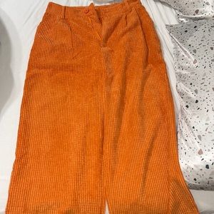 Orange textured high rise wide legged pants